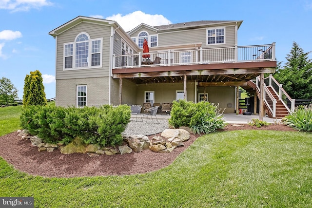 18604 Wild Raspberry Dr, Purcellville, VA 20132 - rear view of house featuring a wooden deck, a patio, and a lawn