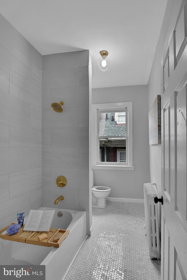 4316 9th St NW, Washington, DC 20011 - full bathroom with toilet, radiator heating unit, shower / bathtub combination, baseboards, and tile patterned floors