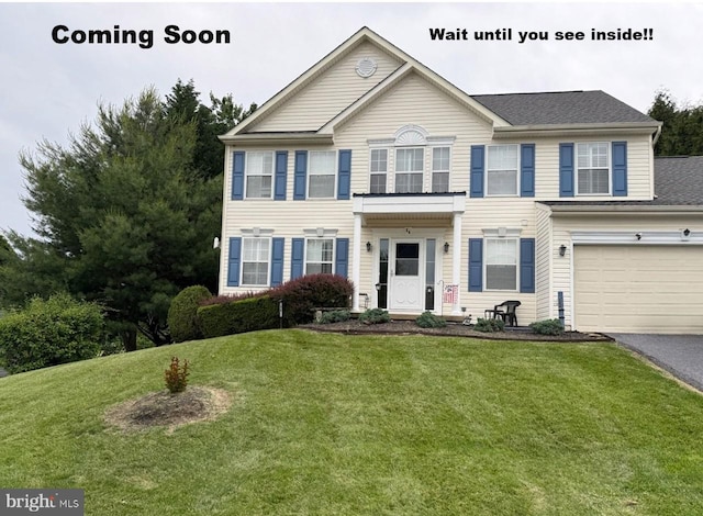 54 Saddleridge Ct, Myersville, MD 21773 - view of front facade featuring asphalt driveway and a front yard