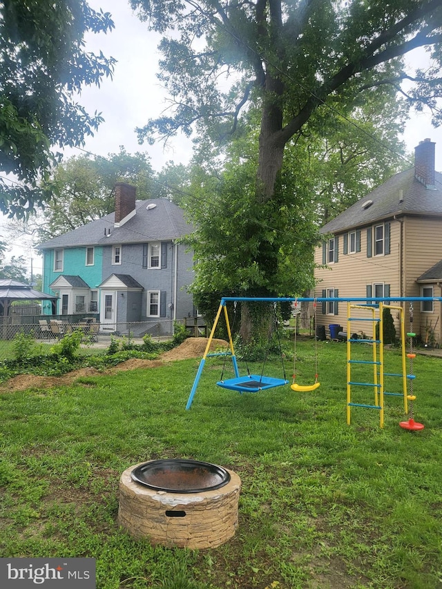 230 New Jersey Rd, Brooklawn, NJ 08030 - view of yard featuring a playground and a fire pit