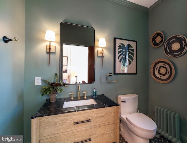 1901 Wyoming Ave NW Unit 40, Washington, DC 20009 - half bath with radiator, vanity, toilet, and ornamental molding