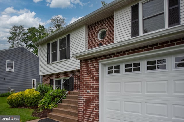 22 Buck Rd, Stafford, VA 22556 - view of front of property featuring brick siding and a garage