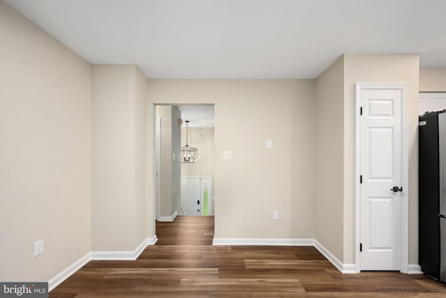22 Buck Rd, Stafford, VA 22556 - empty room featuring baseboards, wood finished floors, and a chandelier