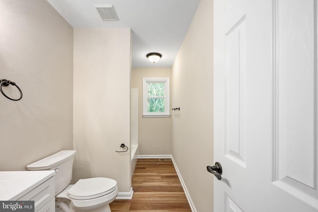 22 Buck Rd, Stafford, VA 22556 - full bath with toilet, vanity, wood finished floors, and baseboards