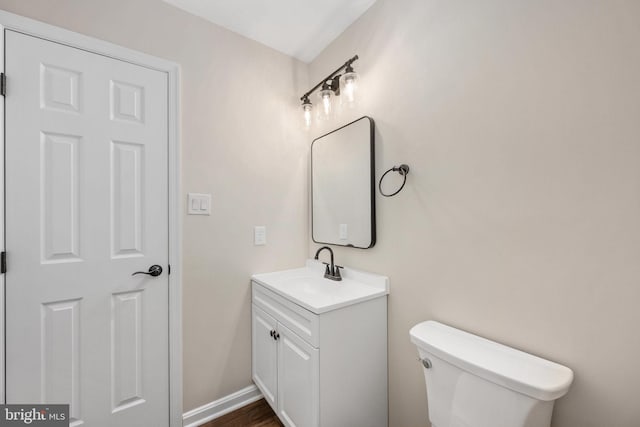 22 Buck Rd, Stafford, VA 22556 - bathroom featuring vanity, toilet, and baseboards