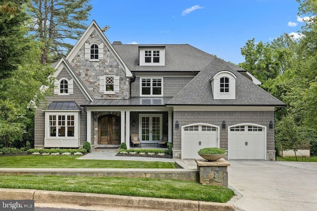 1601 E Ave, Mclean, VA 22101 - view of front of house with french doors, concrete driveway, a shingled roof, an attached garage, and a front lawn
