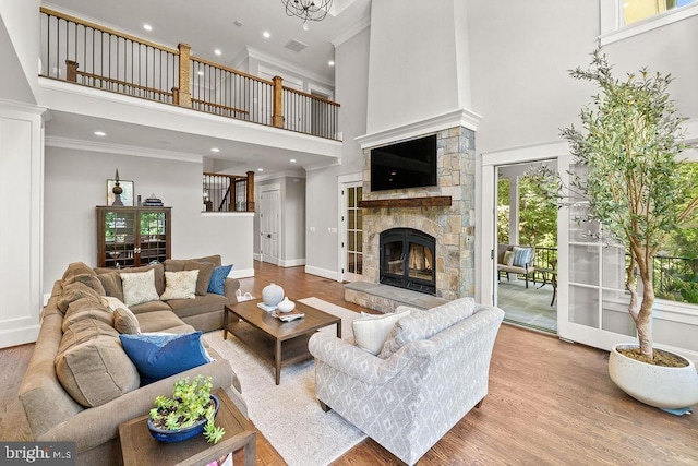 1601 E Ave, Mclean, VA 22101 - living room with a high ceiling, ornamental molding, a fireplace, baseboards, and recessed lighting