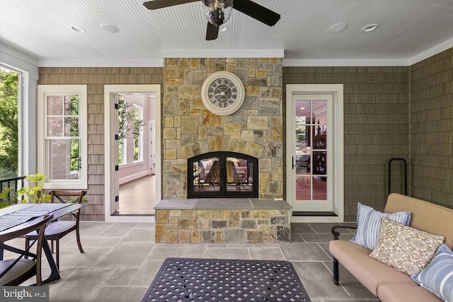 1601 E Ave, Mclean, VA 22101 - living area with ceiling fan, crown molding, and a stone fireplace
