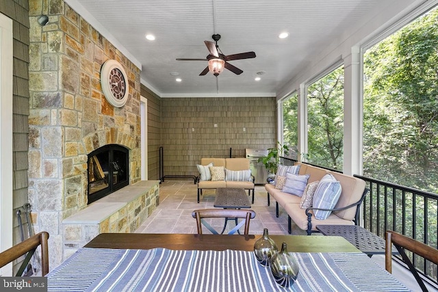 1601 E Ave, Mclean, VA 22101 - sunroom with healthy amount of natural light, a ceiling fan, and an outdoor living space with a fireplace