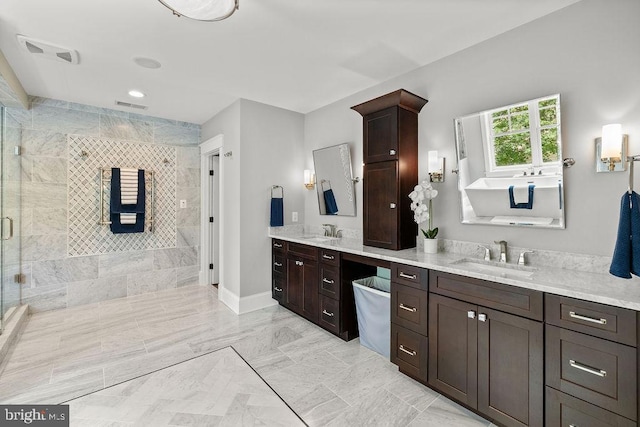 1601 E Ave, Mclean, VA 22101 - bathroom with two vanities, a shower stall, and a soaking tub