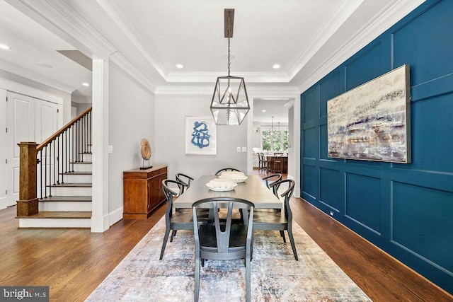 1601 E Ave, Mclean, VA 22101 - dining room with dark wood-type flooring, a chandelier, stairway, a decorative wall, and ornamental molding
