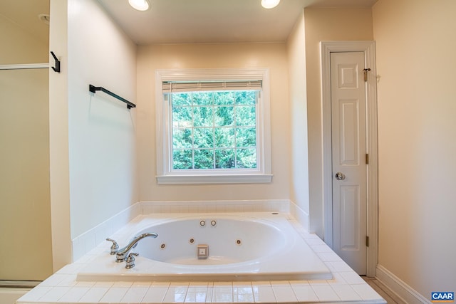 5301 Little Fox Ln, Charlottesville, VA 22903 - bathroom featuring a tub with jets and recessed lighting