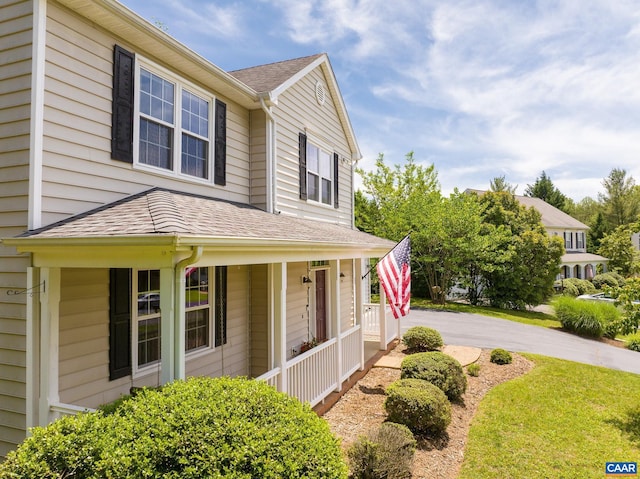 5301 Little Fox Ln, Charlottesville, VA 22903 - view of front of home featuring covered porch, a shingled roof, and a front yard