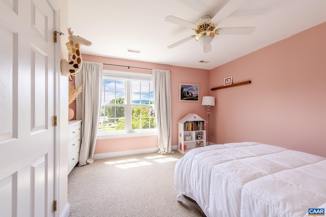 5301 Little Fox Ln, Charlottesville, VA 22903 - bedroom with baseboards, light carpet, and a ceiling fan