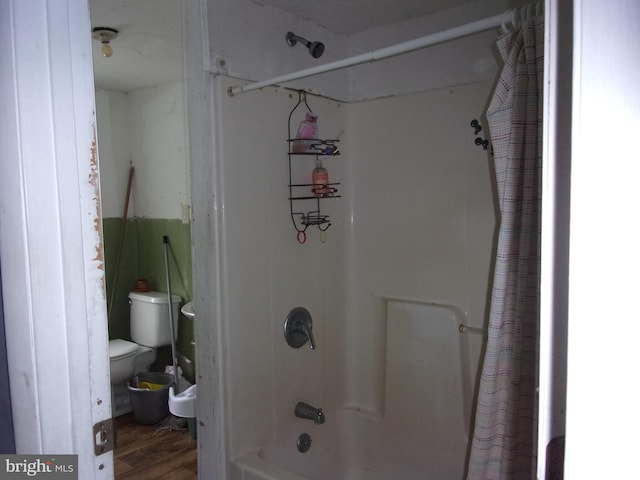 204 Hayward St, Cambridge, MD 21613 - bathroom featuring toilet, shower / tub combo, and wood finished floors