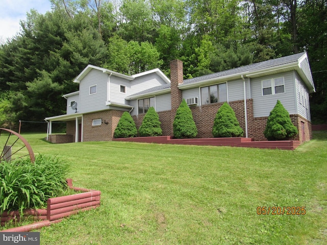 410 Pine Glen Rd, Moshannon, PA 16859 - view of front of property with brick siding, a front lawn, and a chimney