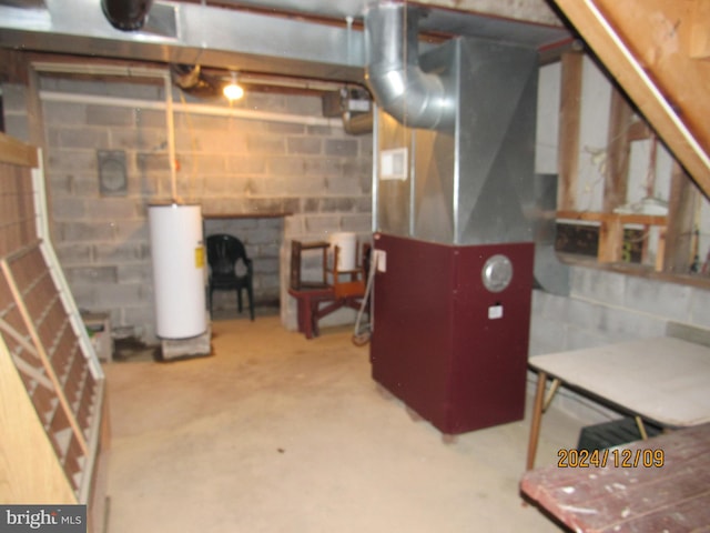 410 Pine Glen Rd, Moshannon, PA 16859 - unfinished basement featuring gas water heater, concrete block wall, and heating unit