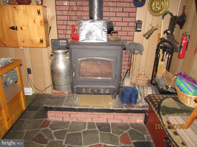 410 Pine Glen Rd, Moshannon, PA 16859 - detailed view of a wood stove and a fire extinguisher