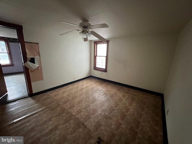209 Blocker St, Ridgeley, WV 26753 - spare room featuring plenty of natural light, baseboards, and ceiling fan