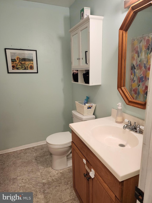 23 Maricopa Trl, Browns Mills, NJ 08015 - bathroom featuring vanity, toilet, and baseboards