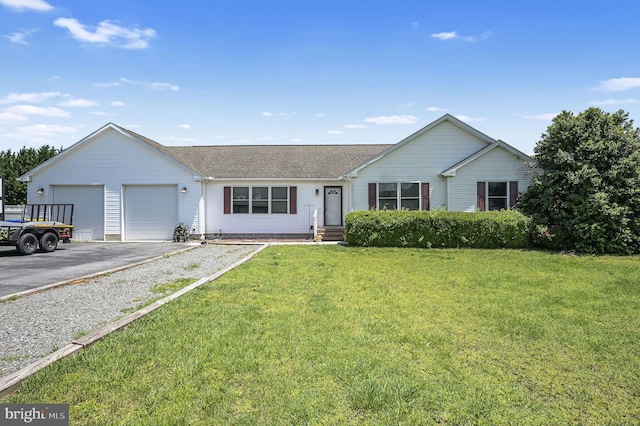 24519 Cedar Ln, Georgetown, DE 19947 - ranch-style house with an attached garage, driveway, a front yard, and roof with shingles