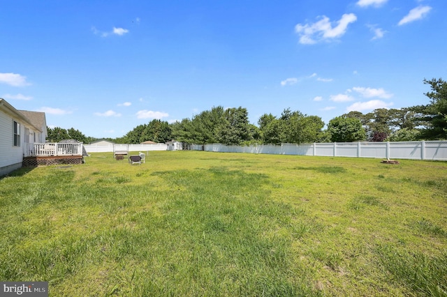 24519 Cedar Ln, Georgetown, DE 19947 - view of yard featuring a deck with water view