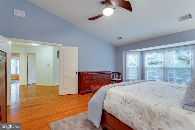 1201 Dartmouth Rd, Alexandria, VA 22314 - bedroom featuring vaulted ceiling, light wood-style floors, multiple windows, a ceiling fan, and baseboards