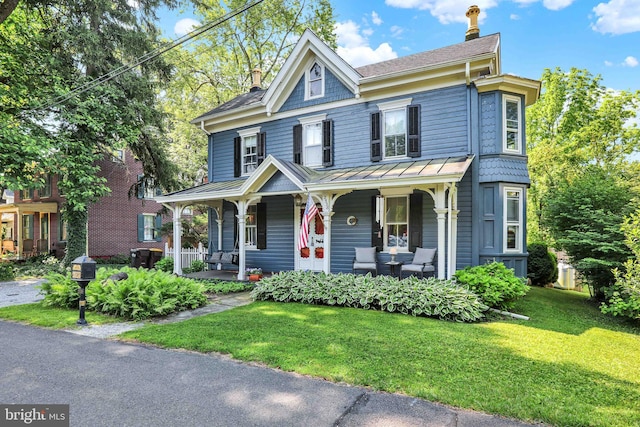 2538 Church Ln, Doylestown, PA 18902 - view of front of house featuring covered porch, a standing seam roof, a front lawn, metal roof, and a shingled roof