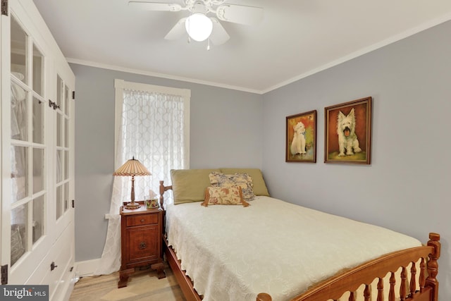 2538 Church Ln, Doylestown, PA 18902 - bedroom featuring ornamental molding, light wood-type flooring, a ceiling fan, and baseboards