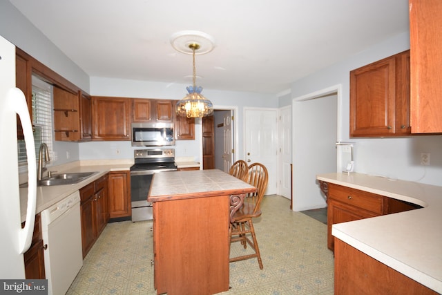 10 Eastbrooke Dr, Ephrata, PA 17522 - kitchen featuring stainless steel appliances, a sink, light floors, a center island, and a kitchen breakfast bar