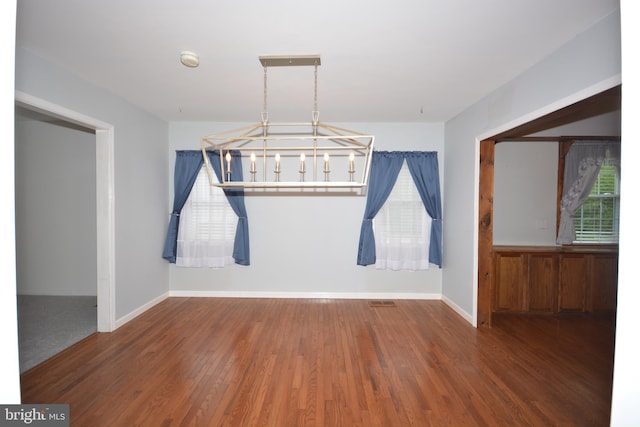 10 Eastbrooke Dr, Ephrata, PA 17522 - unfurnished dining area featuring wood finished floors, a chandelier, and baseboards