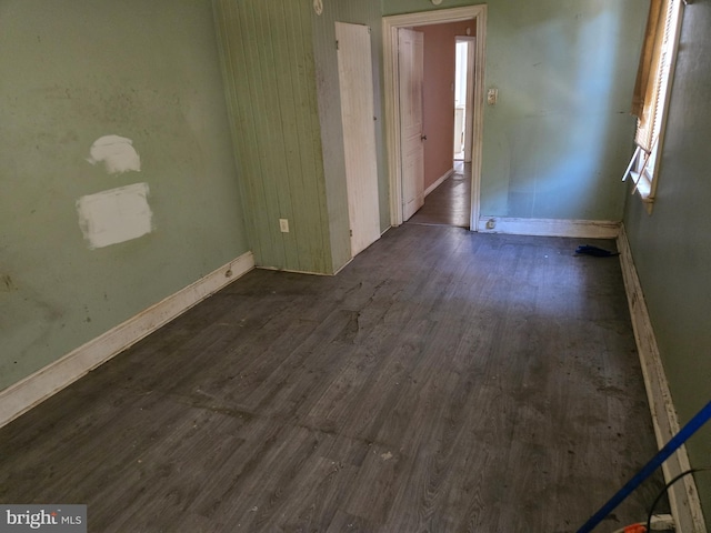 1151 E King St, York, PA 17403 - empty room featuring dark wood finished floors and baseboards