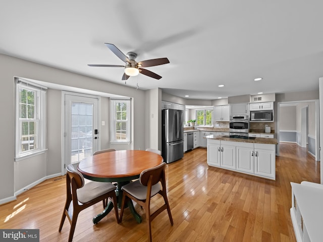 2200 Traies Ct, Alexandria, VA 22306 - dining space featuring baseboards, a ceiling fan, healthy amount of natural light, and recessed lighting