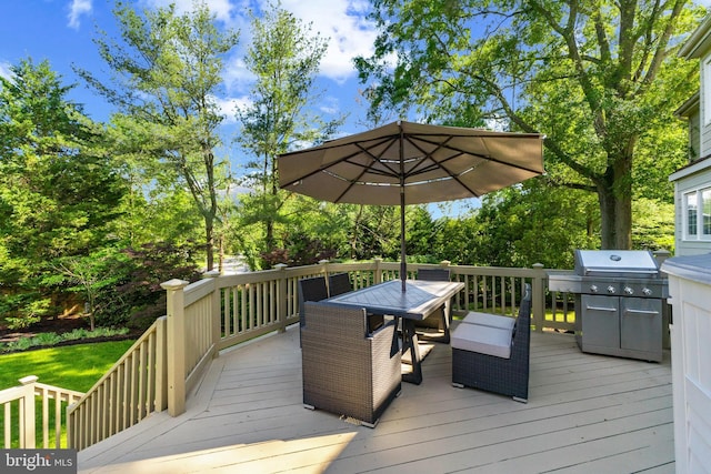 2200 Traies Ct, Alexandria, VA 22306 - wooden deck featuring outdoor dining space, view of wooded area, and a grill
