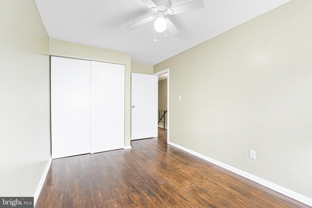 5649 Kavon Ave, Baltimore, MD 21206 - unfurnished bedroom featuring baseboards, wood finished floors, a closet, and ceiling fan