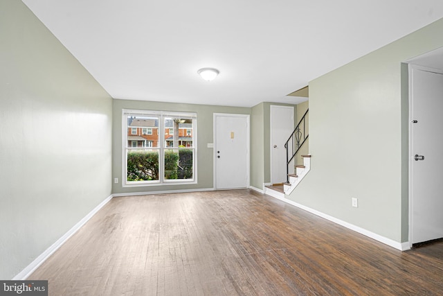 5649 Kavon Ave, Baltimore, MD 21206 - entryway with wood finished floors, baseboards, and stairs