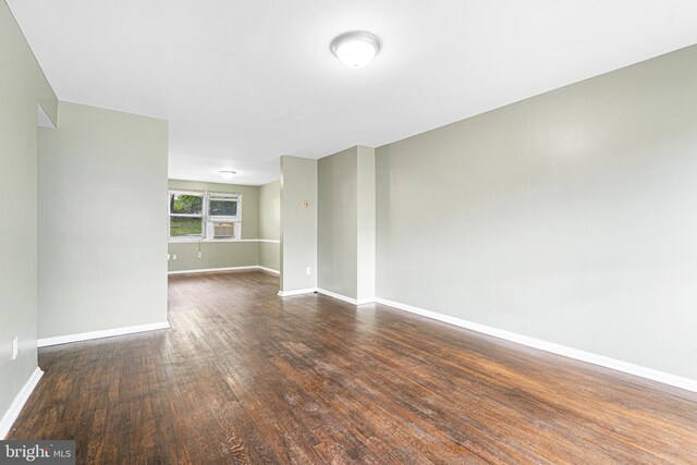 5649 Kavon Ave, Baltimore, MD 21206 - empty room with baseboards and dark wood-style flooring