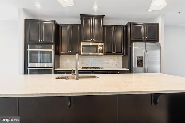 14438 Mattawoman Dr Unit 5000H, Brandywine, MD 20613 - kitchen with appliances with stainless steel finishes, a sink, decorative backsplash, light stone counters, and recessed lighting