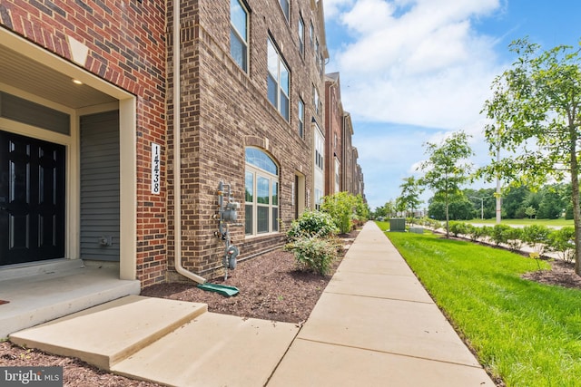 14438 Mattawoman Dr Unit 5000H, Brandywine, MD 20613 - property entrance featuring brick siding and a yard