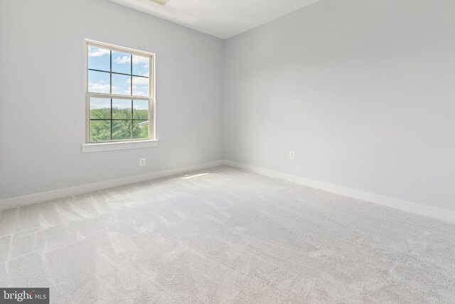 14438 Mattawoman Dr Unit 5000H, Brandywine, MD 20613 - spare room featuring baseboards and light colored carpet