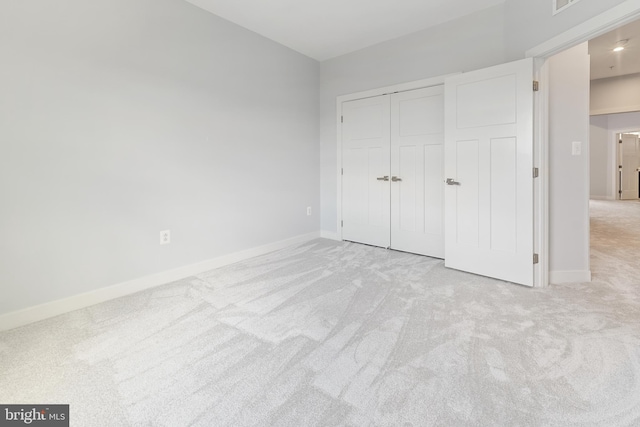 14438 Mattawoman Dr Unit 5000H, Brandywine, MD 20613 - unfurnished bedroom featuring carpet floors, baseboards, and a closet