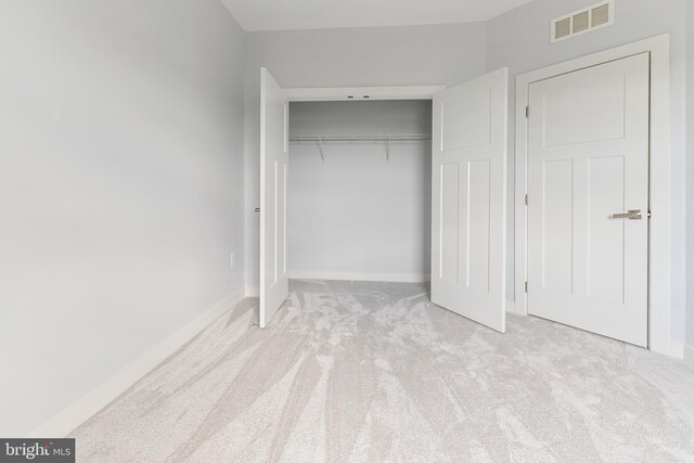 14438 Mattawoman Dr Unit 5000H, Brandywine, MD 20613 - unfurnished bedroom with carpet flooring, a closet, and baseboards