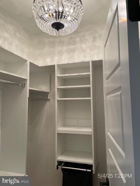 31123 Surfbird Way, Millsboro, DE 19966 - walk in closet with a chandelier