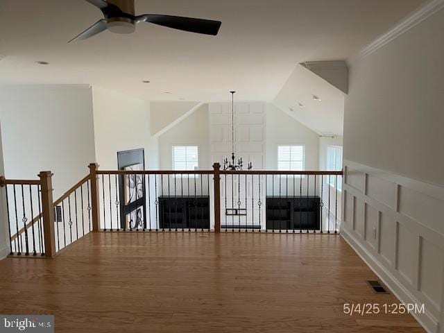 31123 Surfbird Way, Millsboro, DE 19966 - hallway featuring wood finished floors, an upstairs landing, and vaulted ceiling