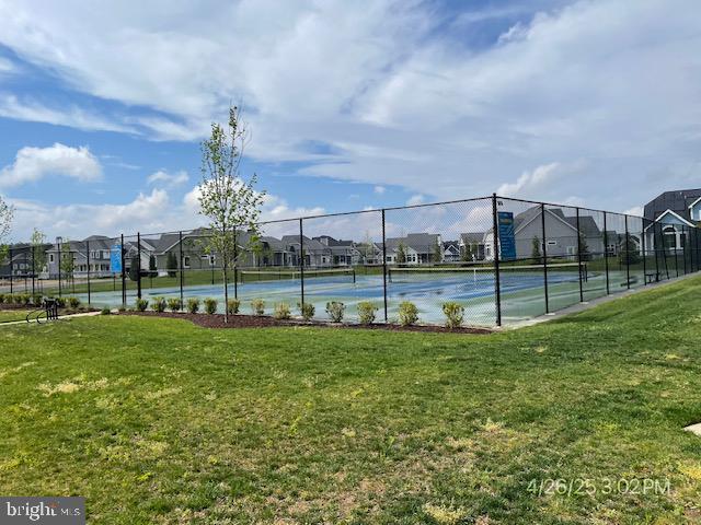 31123 Surfbird Way, Millsboro, DE 19966 - view of tennis court featuring a residential view