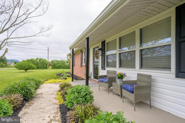 1267 Dominion Rd, Gerrardstown, WV 25420 - covered porch with a lawn