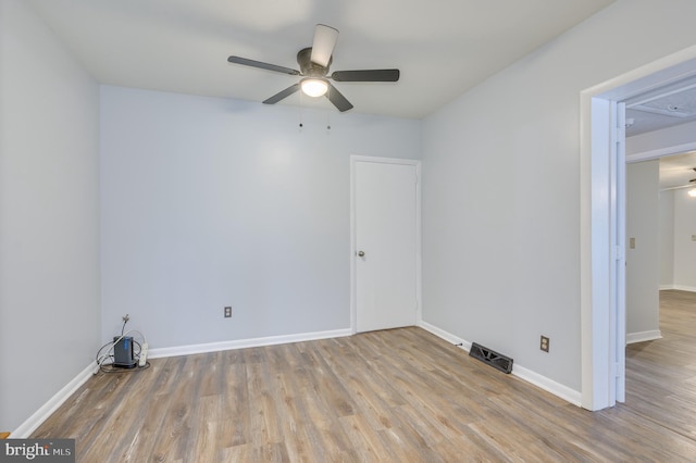 1267 Dominion Rd, Gerrardstown, WV 25420 - empty room with ceiling fan, wood finished floors, and baseboards