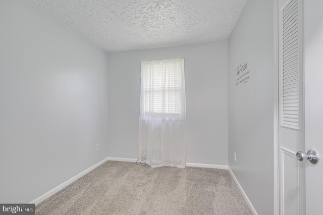 1267 Dominion Rd, Gerrardstown, WV 25420 - carpeted empty room featuring a textured ceiling and baseboards