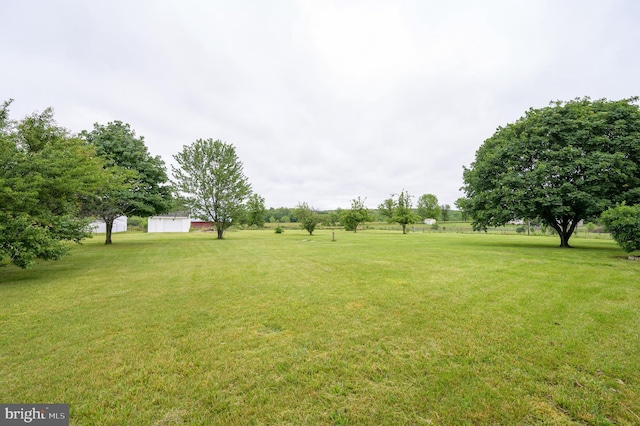 1267 Dominion Rd, Gerrardstown, WV 25420 - view of grassy yard featuring an outdoor structure