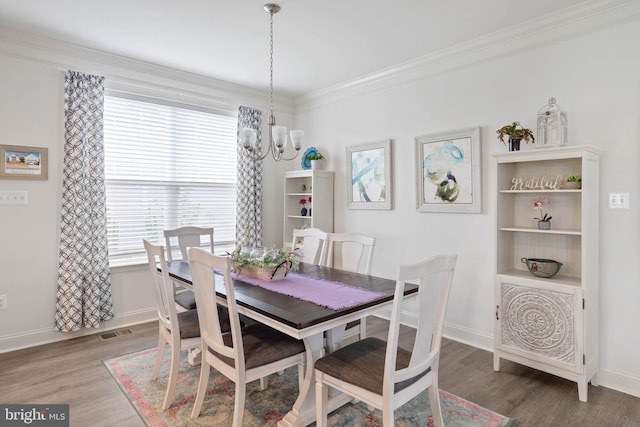 20093 Old Salt Ln, Frankford, DE 19945 - dining area with a chandelier, wood finished floors, baseboards, and ornamental molding